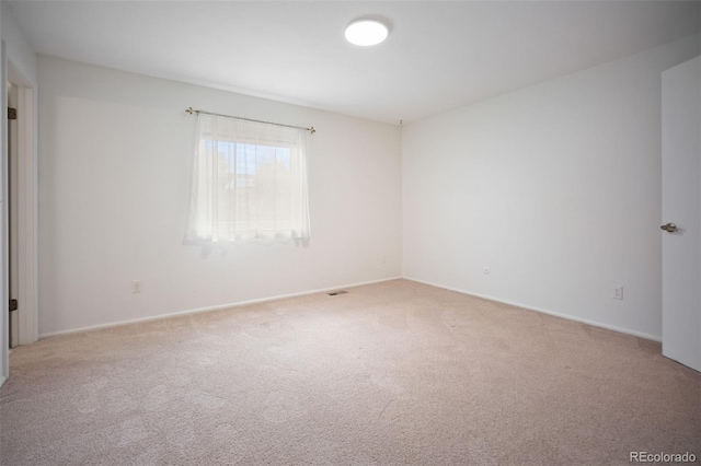 7659 S Holland Way, Littleton, CO 80128 - carpeted spare room with baseboards