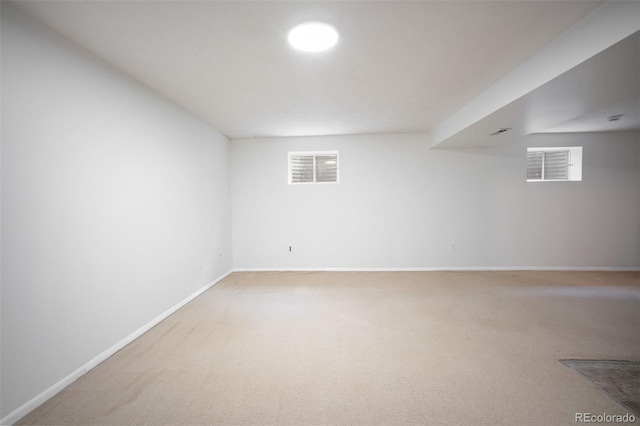 7659 S Holland Way, Littleton, CO 80128 - basement featuring carpet and healthy amount of natural light