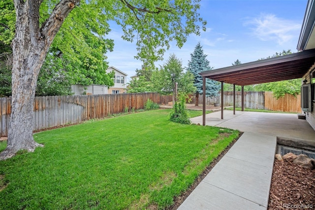 7659 S Holland Way, Littleton, CO 80128 - fenced backyard featuring a patio area