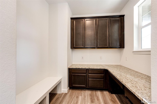 985 S Elk Way, Aurora, CO 80018 - mudroom with built in study area and light wood-style flooring