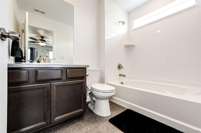 985 S Elk Way, Aurora, CO 80018 - bathroom with vanity, tile patterned floors, bathing tub / shower combination, and ceiling fan