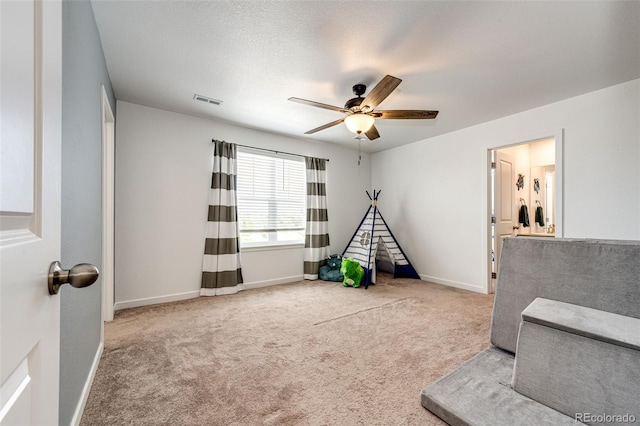 985 S Elk Way, Aurora, CO 80018 - playroom with ceiling fan and carpet flooring