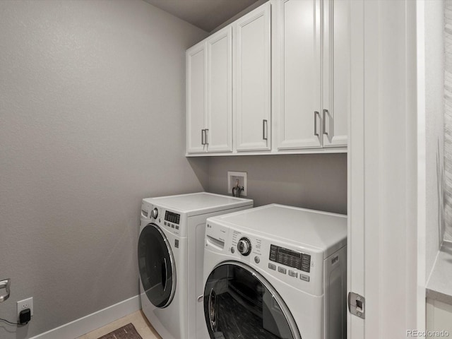9035 S Shawnee Ct, Aurora, CO 80016 - laundry area featuring cabinet space, washer and dryer, and baseboards