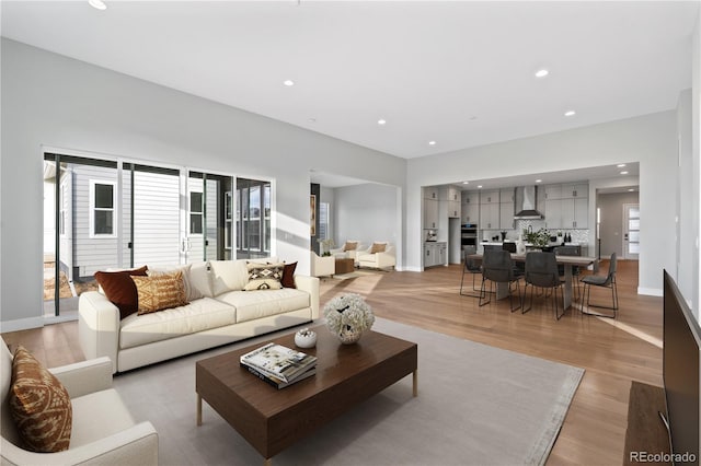 living room with light hardwood / wood-style floors