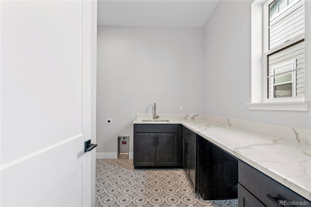 bathroom featuring sink and tile patterned floors