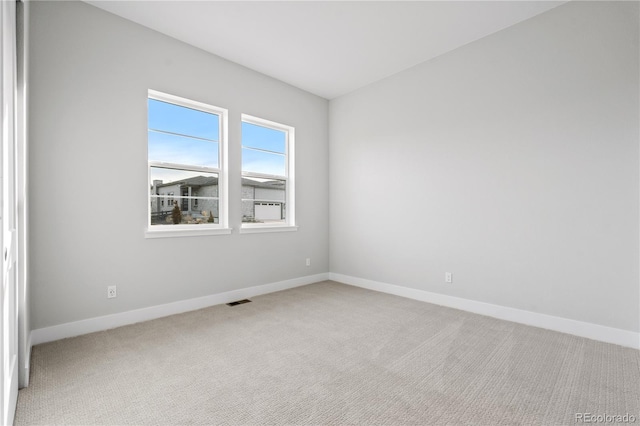 view of carpeted spare room