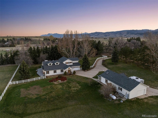 aerial view at dusk with a mountain view