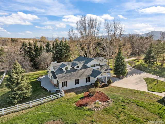 birds eye view of property featuring a mountain view