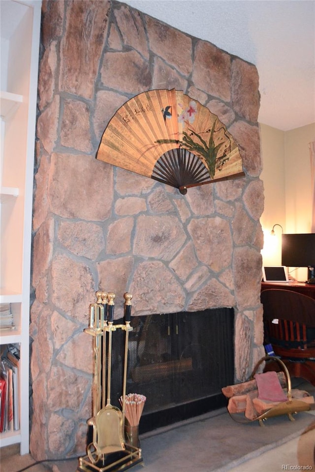 details with a fireplace and concrete flooring