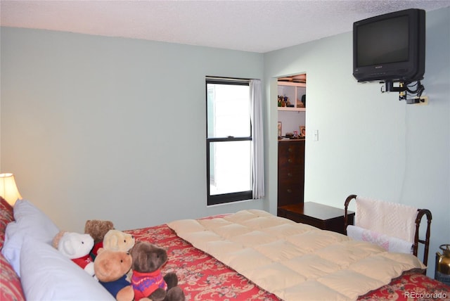 bedroom with a textured ceiling