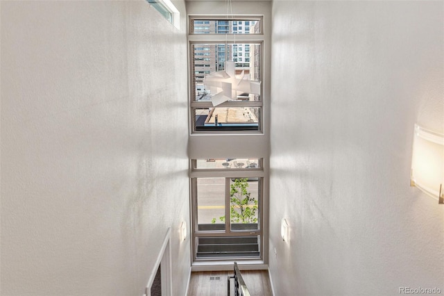1012 Bannock St, Denver, CO 80204 - staircase featuring wood finished floors
