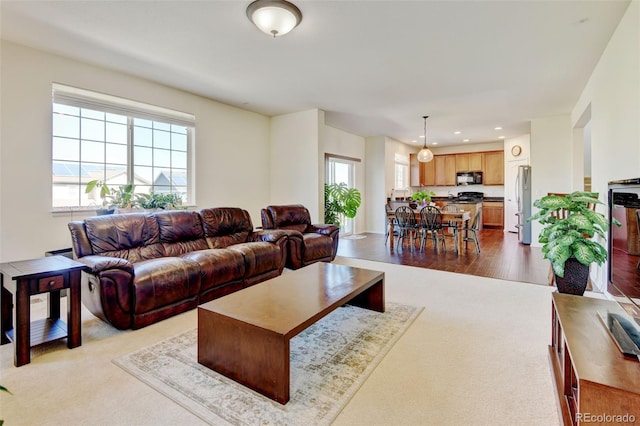 7081 S Oak Hill Cir, Aurora, CO 80016 - living room with recessed lighting and dark carpet