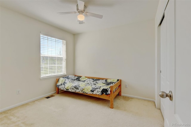 7081 S Oak Hill Cir, Aurora, CO 80016 - bedroom with carpet, baseboards, a ceiling fan, and a closet