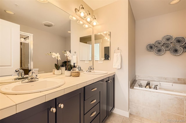 3411 N Xenia St, Denver, CO 80238 - full bathroom with double vanity, tile patterned flooring, and a garden tub