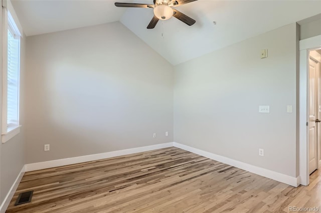 3411 N Xenia St, Denver, CO 80238 - empty room with a ceiling fan, light wood-style floors, plenty of natural light, and vaulted ceiling