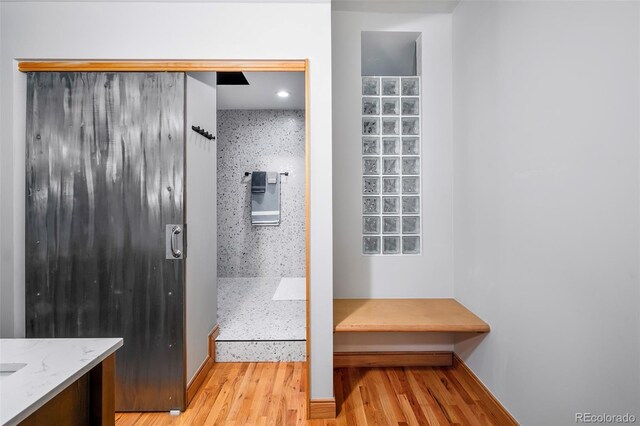 bathroom featuring vanity and hardwood / wood-style floors