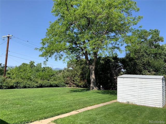 2797 S Newton Way, Denver, CO 80236 - view of green lawn with a storage unit