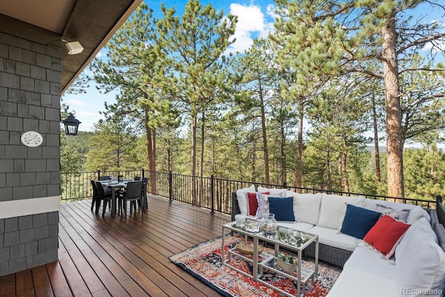 deck featuring outdoor lounge area