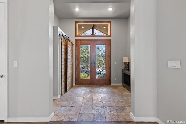 foyer entrance featuring french doors