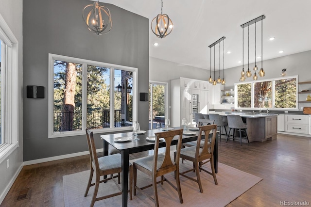 dining space featuring dark hardwood / wood-style flooring