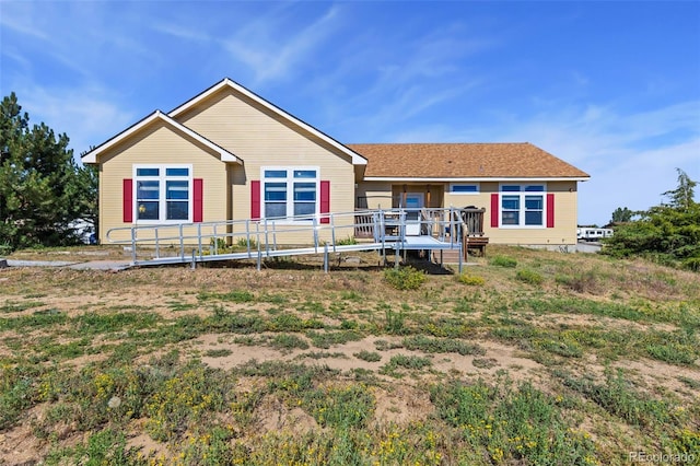 4241 Meadowlark Rd, Fort Lupton, CO 80621 - back of property featuring a wooden deck