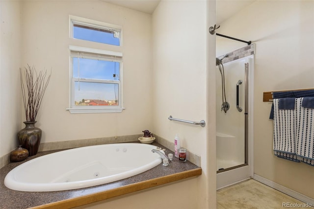 4241 Meadowlark Rd, Fort Lupton, CO 80621 - full bath featuring a shower stall and a jetted tub