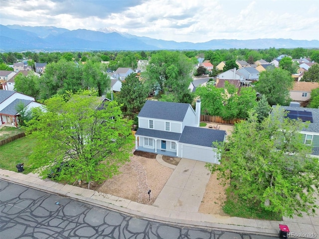 2726 Dickens Dr, Colorado Springs, CO 80916 - aerial perspective of suburban area featuring mountains