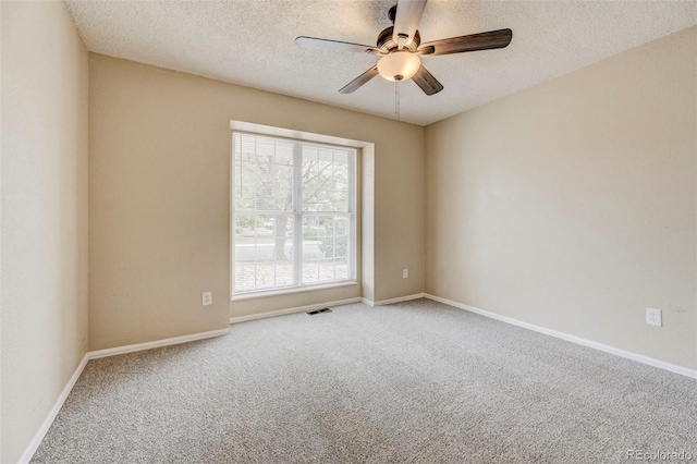 2726 Dickens Dr, Colorado Springs, CO 80916 - carpeted spare room featuring a ceiling fan, a textured ceiling, and baseboards