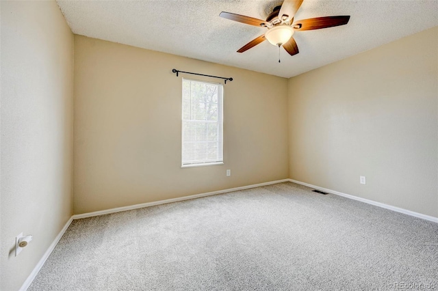 2726 Dickens Dr, Colorado Springs, CO 80916 - carpeted spare room featuring ceiling fan, baseboards, and a textured ceiling
