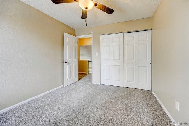 2726 Dickens Dr, Colorado Springs, CO 80916 - unfurnished bedroom with carpet flooring, a textured ceiling, and baseboards