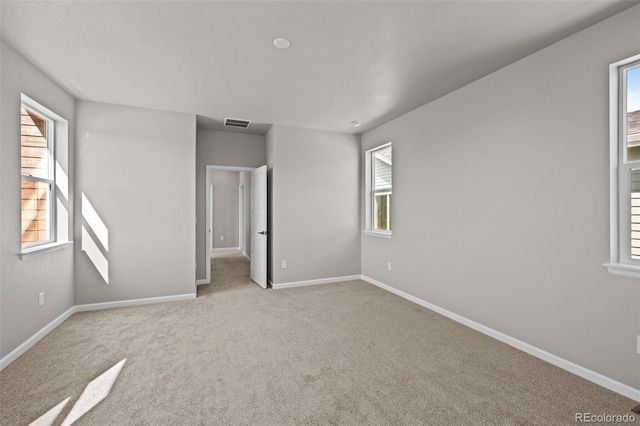 20871 E 60th Ave, Aurora, CO 80019 - unfurnished bedroom featuring carpet floors and baseboards
