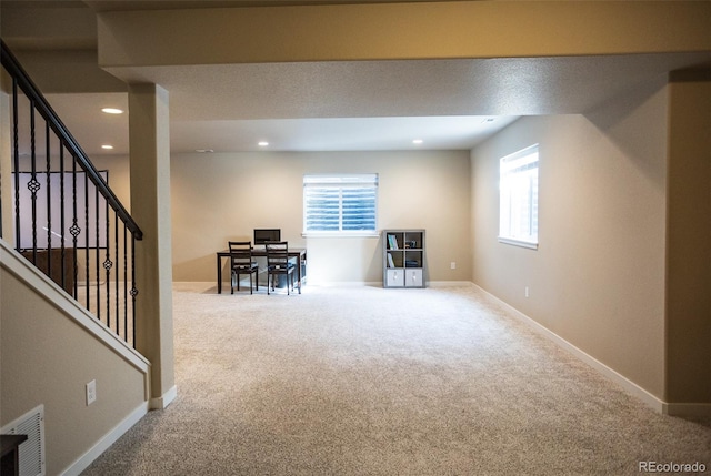 unfurnished office featuring recessed lighting, baseboards, visible vents, and carpet floors