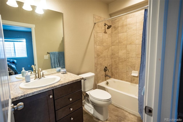 full bathroom with tile patterned floors, toilet, shower / bath combo, and vanity