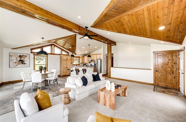 living room featuring baseboards, recessed lighting, ceiling fan, and light colored carpet