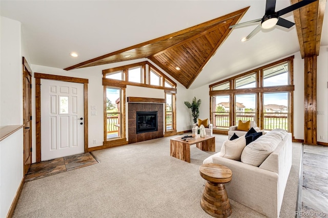 living area featuring beamed ceiling, baseboards, light colored carpet, recessed lighting, and wooden ceiling