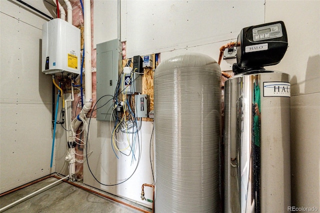 utility room featuring water heater