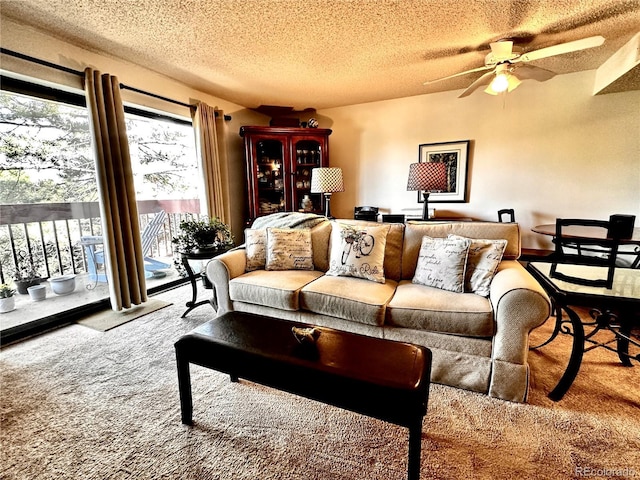 12565 Sheridan Blvd Unit 212, Broomfield, CO 80020 - living area with a textured ceiling, a ceiling fan, and carpet flooring