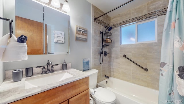 bathroom with shower / bath combination with curtain, toilet, and vanity