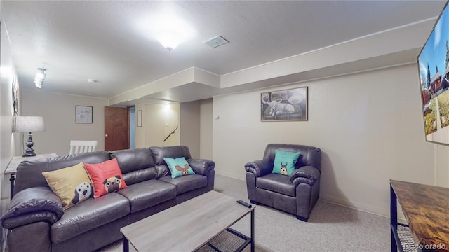 living room with carpet flooring and visible vents