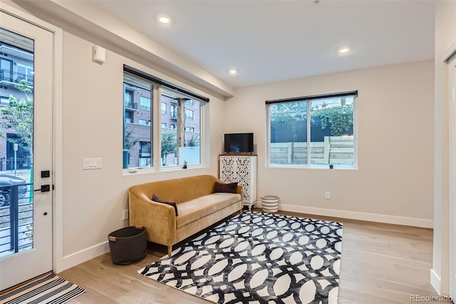 4025 Jason St Unit 101, Denver, CO 80211 - sitting room with light wood finished floors, healthy amount of natural light, and recessed lighting
