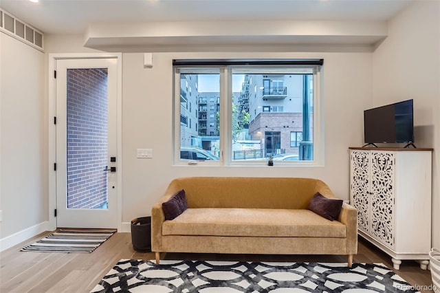 4025 Jason St Unit 101, Denver, CO 80211 - living area featuring wood finished floors and recessed lighting
