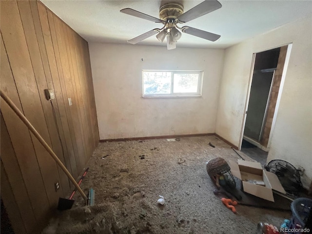 unfurnished bedroom featuring ceiling fan