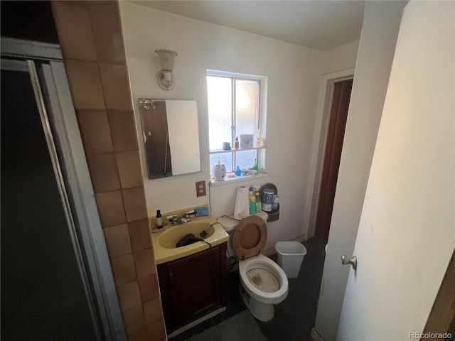 bathroom with vanity and toilet