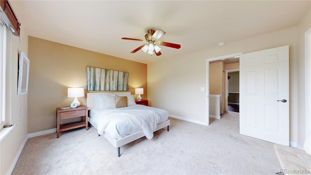 11301 Vernon Way, Parker, CO 80134 - bedroom featuring light colored carpet, baseboards, and a ceiling fan