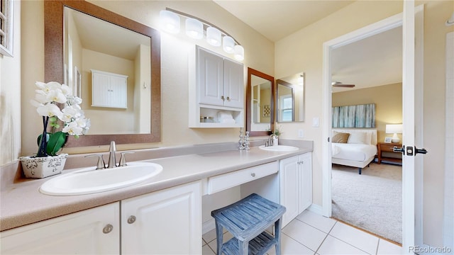 11301 Vernon Way, Parker, CO 80134 - ensuite bathroom featuring double vanity and tile patterned flooring