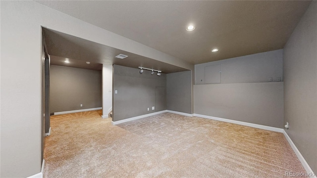 11301 Vernon Way, Parker, CO 80134 - finished basement with carpet flooring, baseboards, rail lighting, and recessed lighting