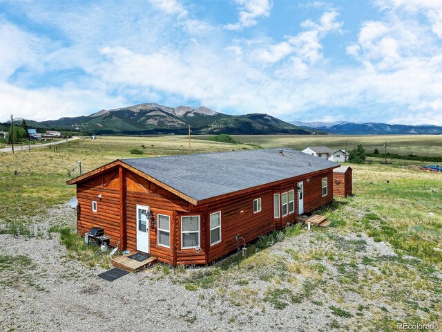 75 Sixth St, Como, CO 80432 - view of home's exterior featuring a rural view and a mountain view