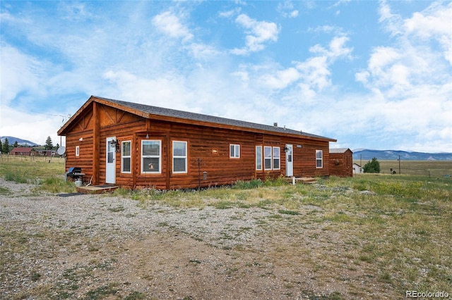 75 Sixth St, Como, CO 80432 - rear view of house with a mountain view