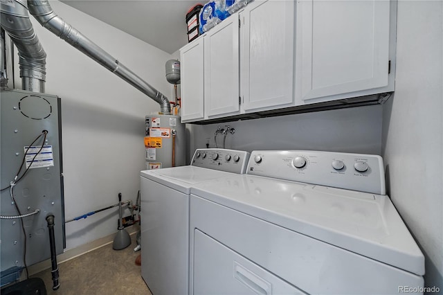 8798 Chase Dr Unit 4, Arvada, CO 80003 - laundry area with cabinet space, washing machine and clothes dryer, gas water heater, and baseboards