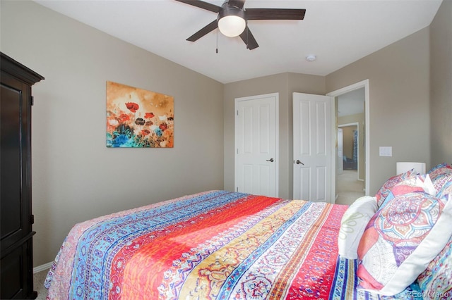 carpeted bedroom with ceiling fan